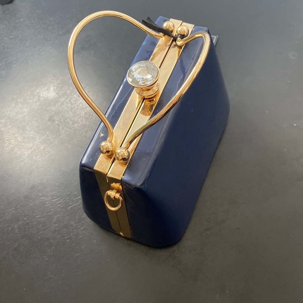 Blue purse with gold